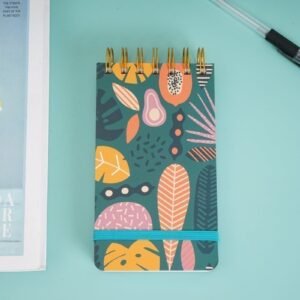 A small notebook (mini notepad) with a pink rubber band.